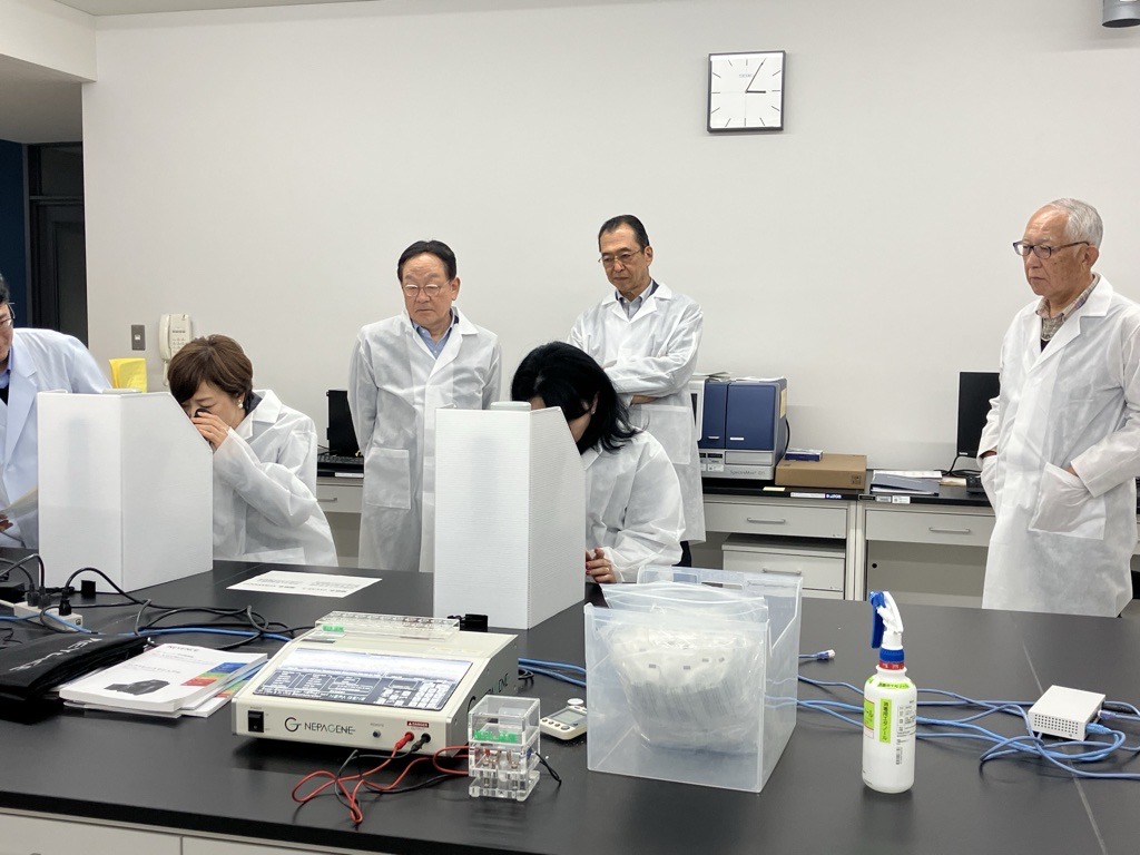 Touring the facility at Tsukuba Research Laboratories